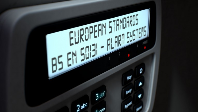 Alarm panel displaying European Standard text
