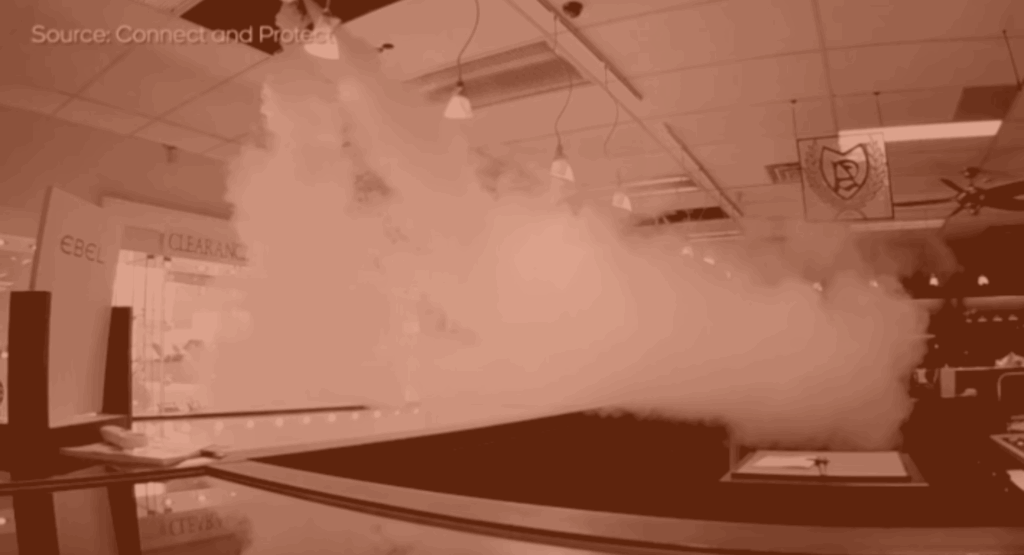 orange hue image of security fog in a jewellery store